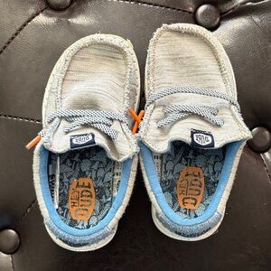 Hey Dude Kids Slip-On Sneakers in Light Gray with Blue Trim and Orange Accent
